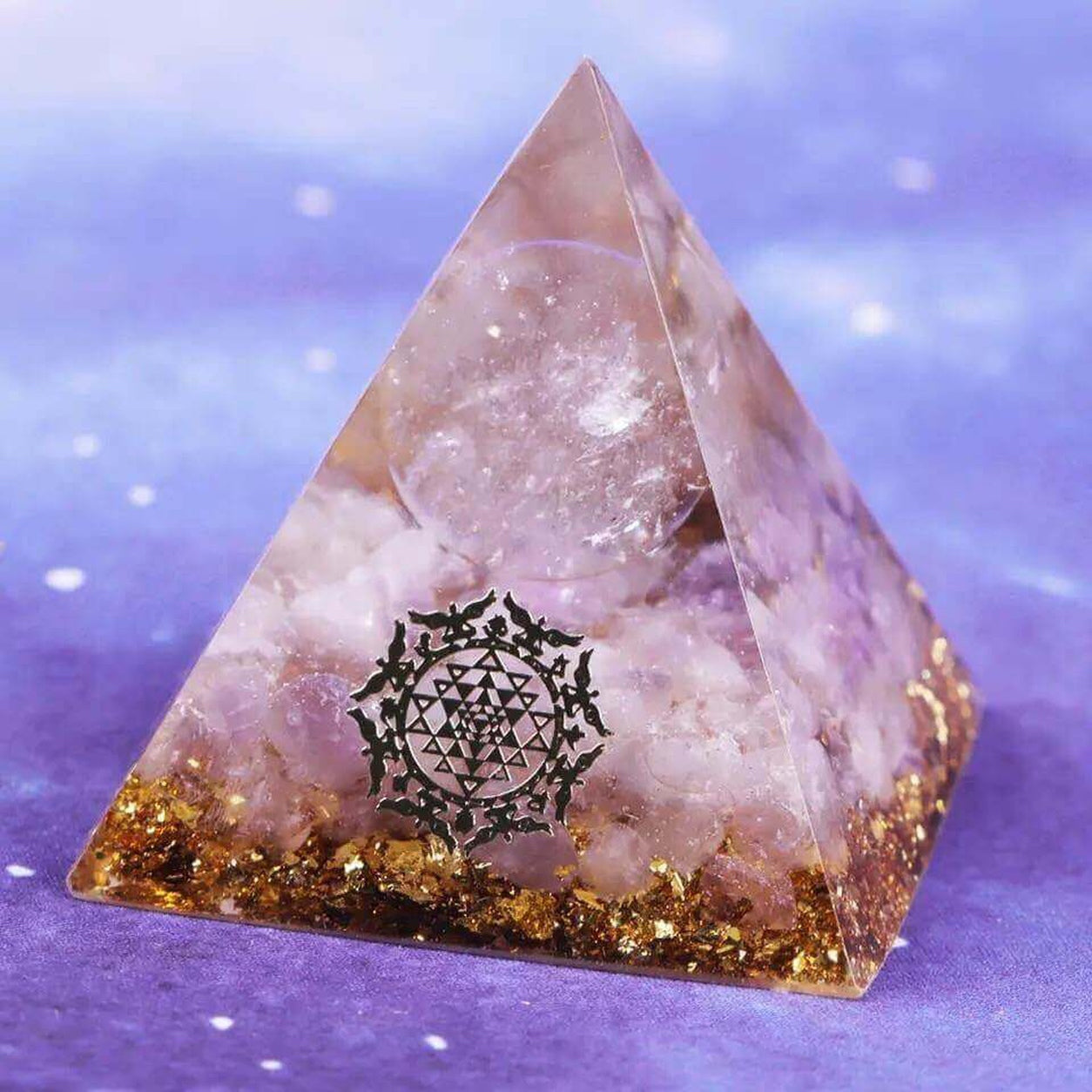 Angled view of the Amethyst & White Crystal Pyramid featuring amethyst crystals, clear crystal sphere, gold foil, and Sri Yantra symbol.