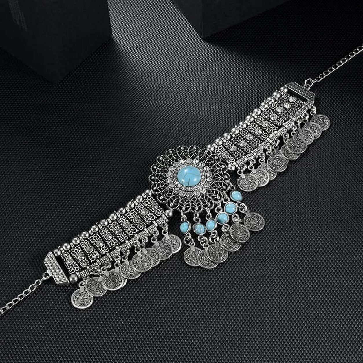 Bohemian Turquoise Collar Necklace with antique silver finish, turquoise centerpiece and decorative coin tassels.