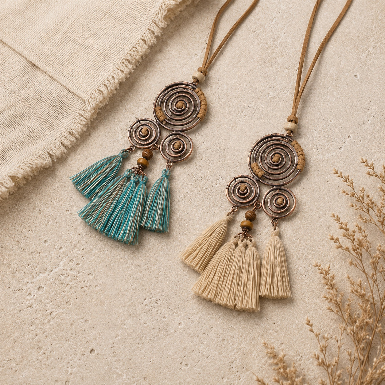 Boho Spiral Tassel Necklace in turquoise and beige tassel styles with faux suede cord displayed on a neutral linen background.