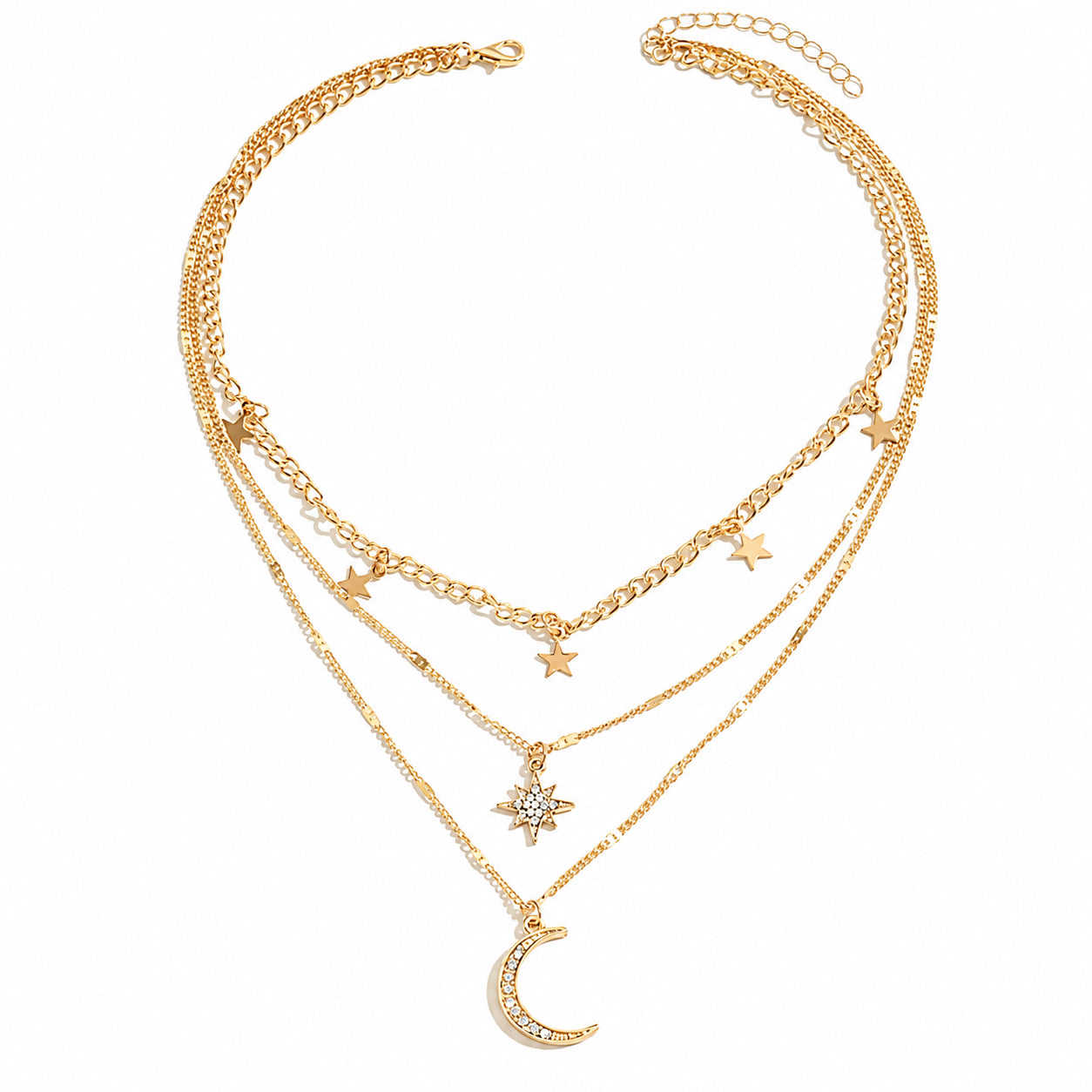 Gold celestial layered necklace with three chains, star charms, starburst pendant and crescent moon.