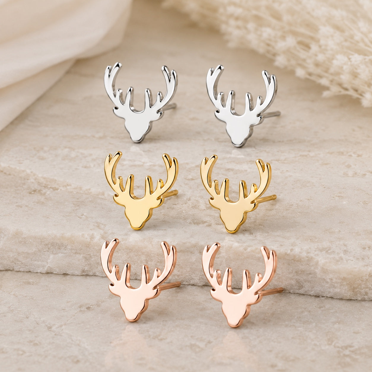 Deer antler stud earrings in silver, gold and rose gold.