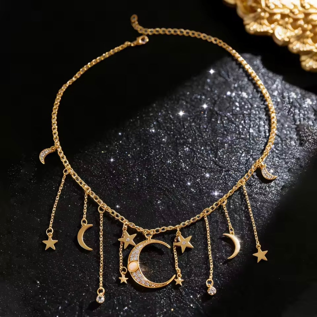 Gold Moon & Stars Charm Necklace with crescent moon and star charms