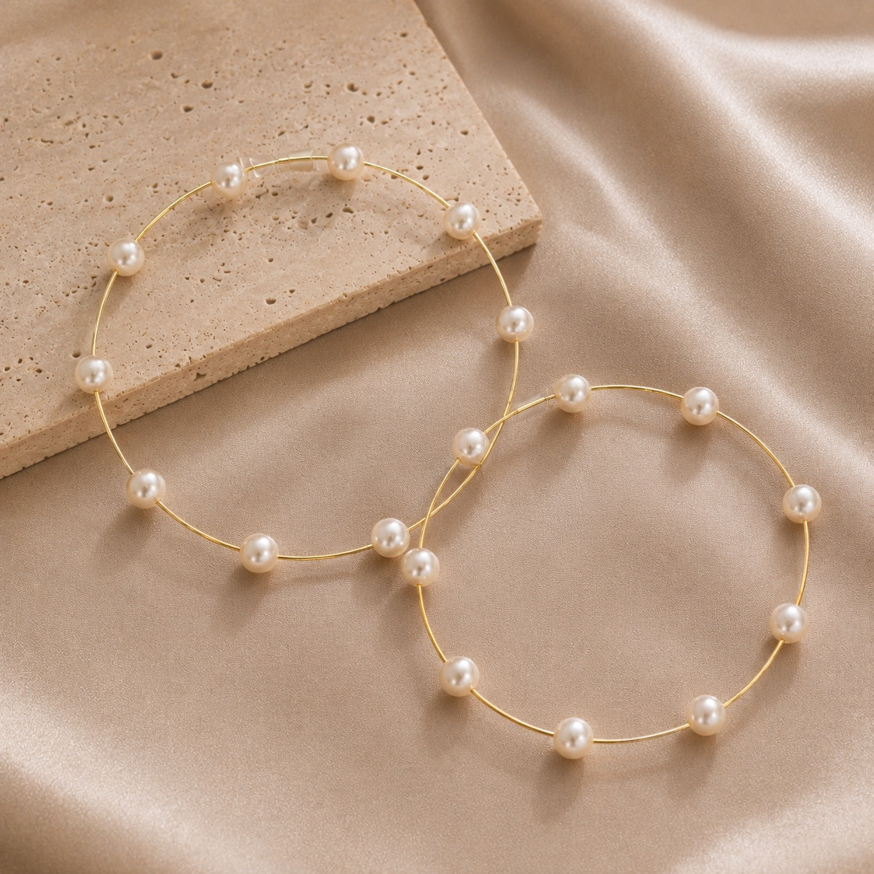 Gold Pearl Hoop Earrings with evenly spaced faux pearls on lightweight oversized hoops.