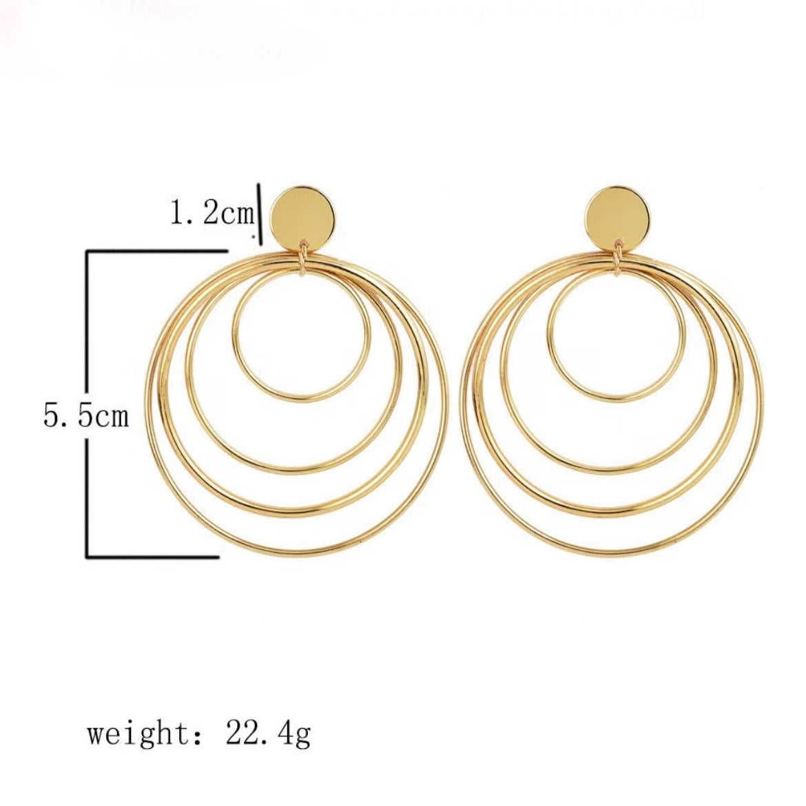Golden Circles Dangle Earrings showing 6.7 cm length, layered gold circle design, and product dimensions.