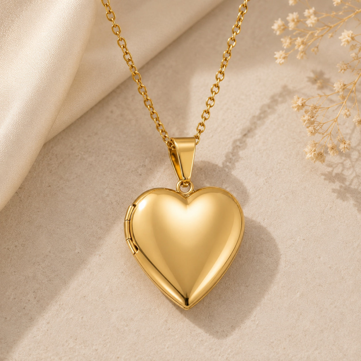 Gold Heart Locket Necklace with polished heart locket pendant for photos or keepsakes.
