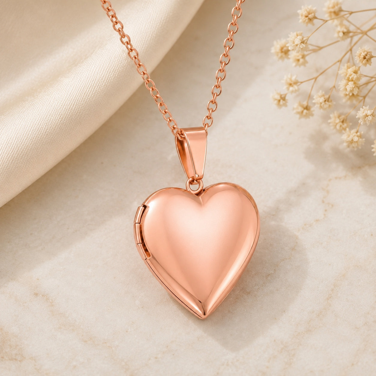 Close-up of the rose gold Heart Locket Necklace with polished heart-shaped pendant.