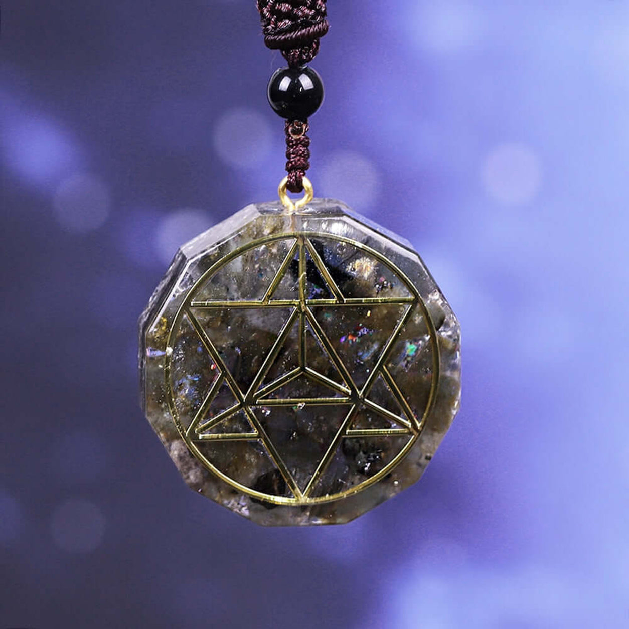 Labradorite Merkaba Pendant Necklace featuring sacred geometry in a faceted labradorite crystal pendant on an adjustable cord.