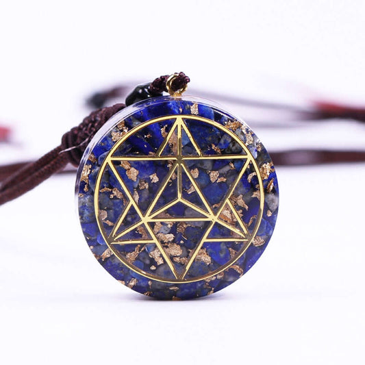 Lapis Lazuli Merkaba Pendant Necklace featuring natural lapis lazuli, gold sacred geometry, and adjustable cord.