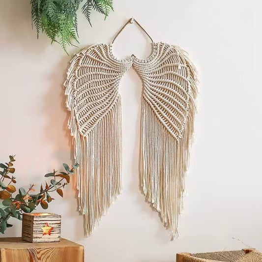 Macrame angel wings wall hanging in natural ivory with long fringe, boho wall decor.