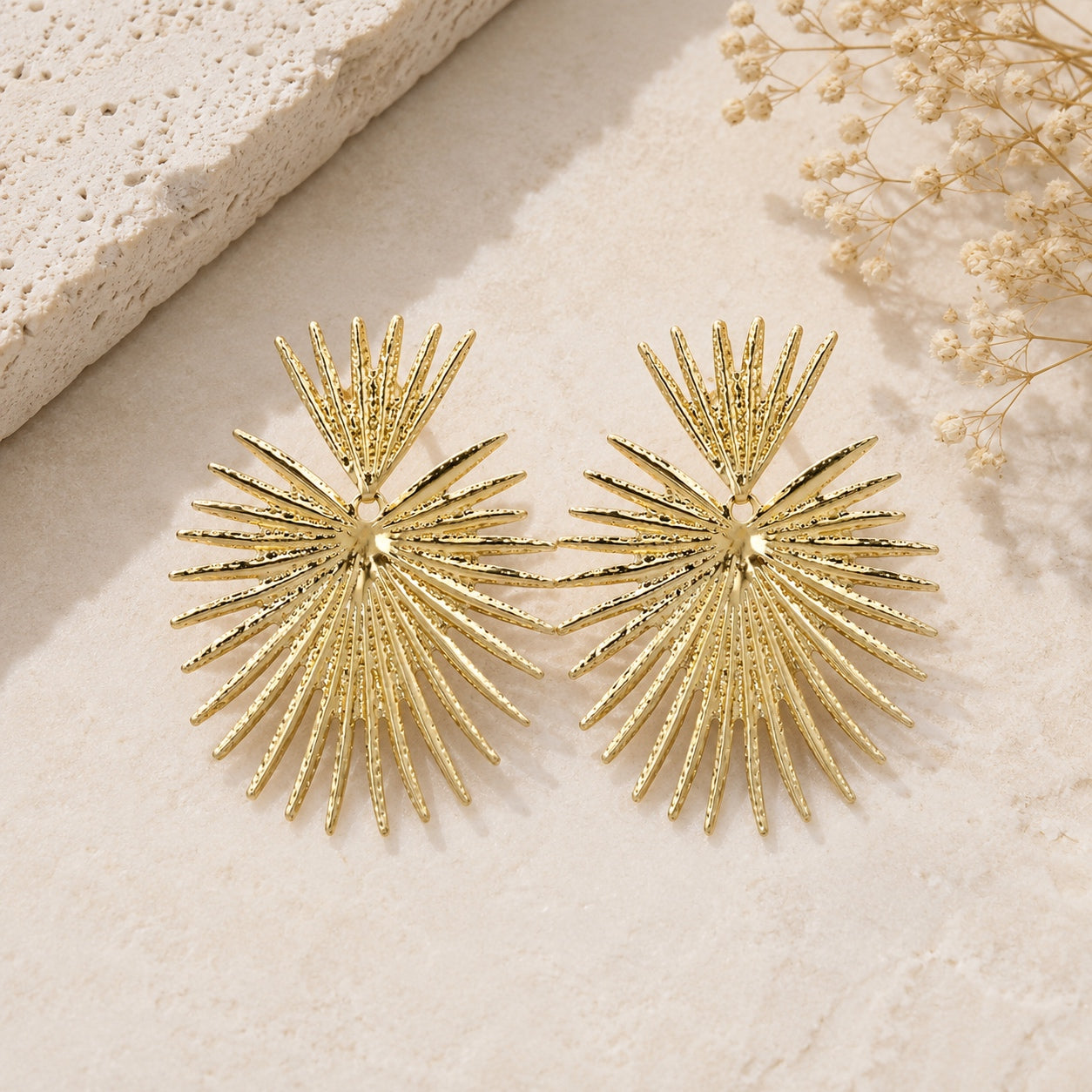 Gold Queen Of Hearts statement earrings with an elegant sunburst fan design, lightweight oversized drop earrings for weddings, vacations and special occasions.