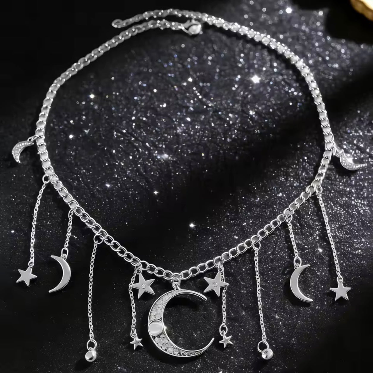 Silver Moon & Stars Charm Necklace featuring crescent moon, stars, and celestial charms