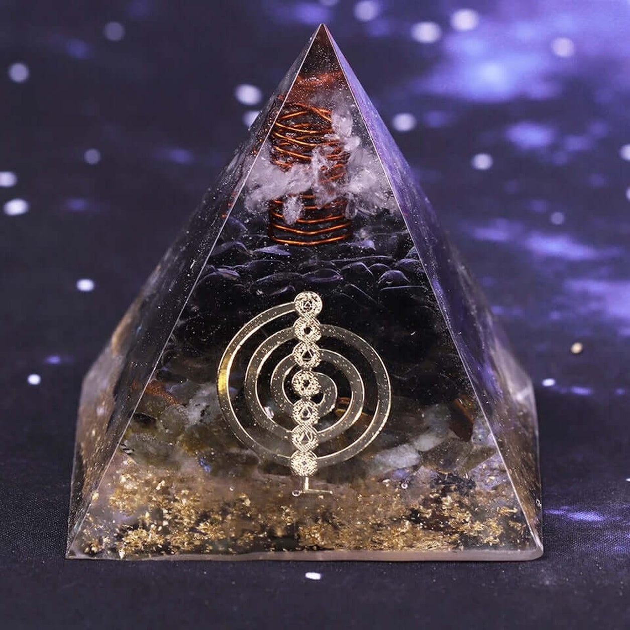 Front view of the Smoky Quartz & Labradorite Crystal Pyramid featuring a copper coil, clear crystal, gold foil, and sacred geometry symbol.