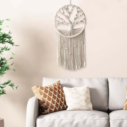 Tree Of Life Macrame Wall Hanging displayed above a sofa in a modern boho living room.