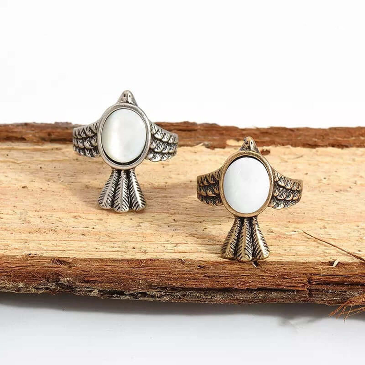 White Jade Bird Ring Set with antique silver and antique bronze bird rings featuring oval white jade stones.
