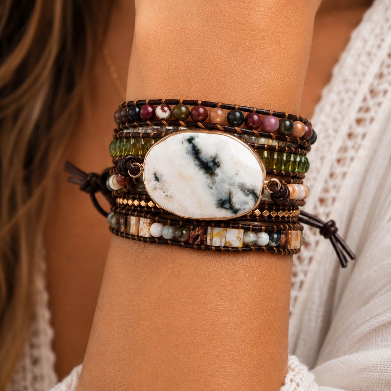 White Marble Stone Wrap Bracelet worn on a woman’s wrist featuring natural white marble stone, leather wrap, and multicolor gemstone beads.