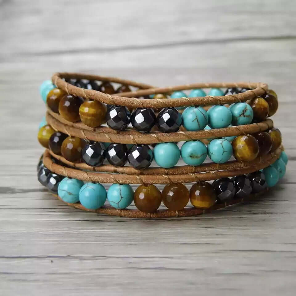 Spirit Of The West Bracelet wrap bracelet with turquoise, tiger eye and hematite gemstone beads on natural leather cord.